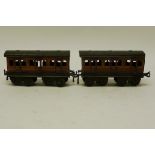 Early Bing O Gauge Midland Railway Bogie Coaches, in crimson with yellow lining, both 1st/3rd