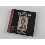 Neil Young / Dead Man / Signature, CD of Dead Man in hard book cover with signature in gold bottom
