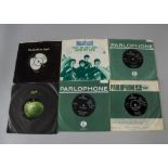 The Beatles / Solo 7" singles, twenty eight 7" singles including a rare 'Beatles On Apple' sleeve,