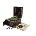 An Apollo table grand gramophone, in oak case, with replacement soundbox, Tritona and three other