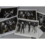 Judas Priest, two autographed promotional photographs 26 cm x 20cm, two b/w prints of the group