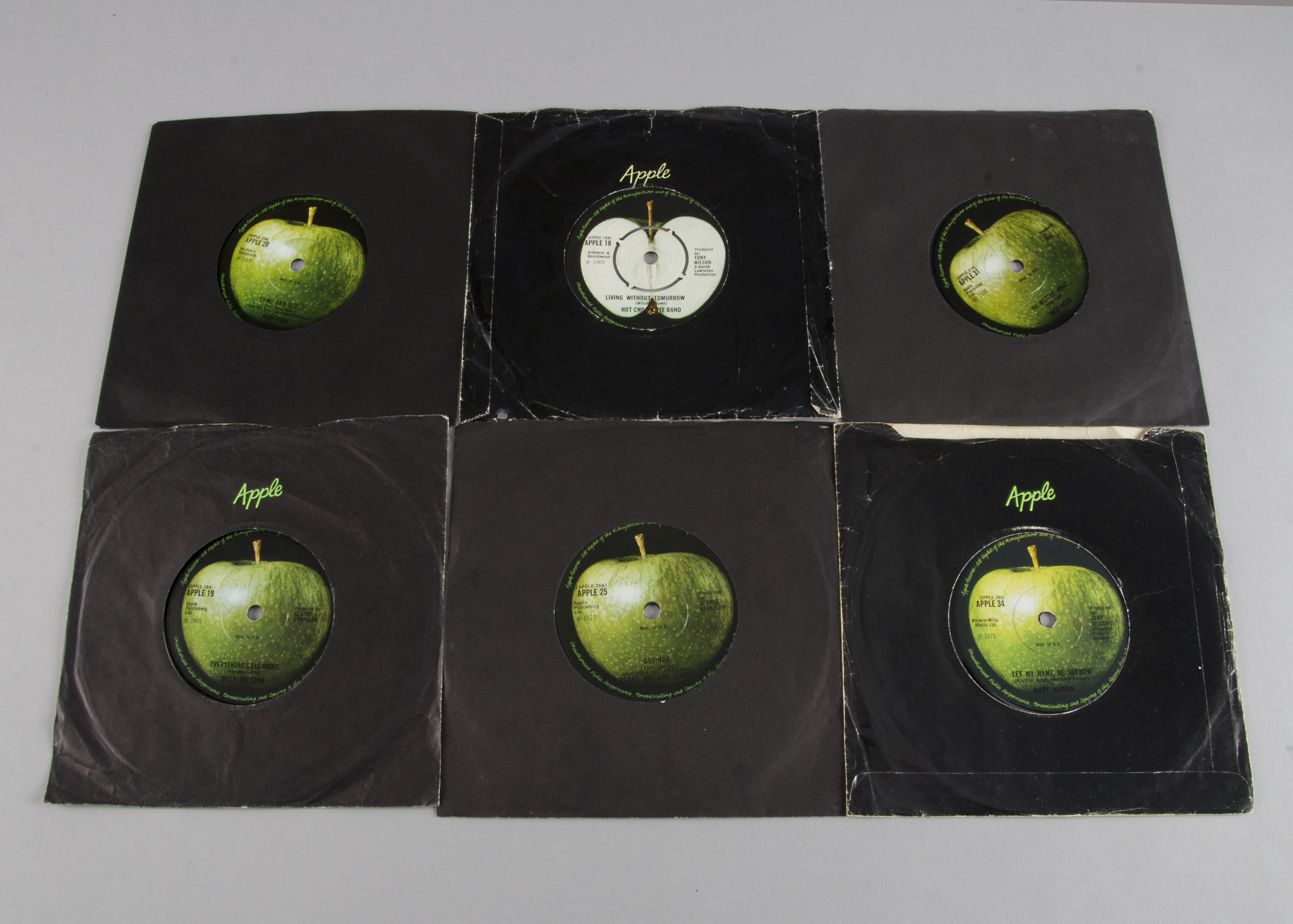 Apple Label, thirteen original 7" singles on the apple label with artists including Trash, Hot