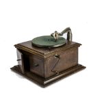 An HMV hornless gramophone, Model III, with chequer stringing to the oak case, dated on base