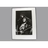 Bob Marley, a large b/w print (77cm x 100cm approx) of Bob Marley performing at Hammersmith Odeon