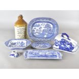 A collection of English and European blue and white ceramics, including two large willow pattern
