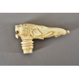 A Victorian ivory cane handle, modelled as an elephants head and trunk with lion head front, 11 cm