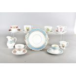 A collection of Staffordshire trios, all with transfer printed floral decoration including a Queen