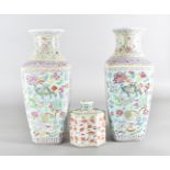 A pair of Chinese famille rose reproduction square tapered vases, 40 cm H, together with a