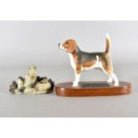 A Beswick model of a beagle, on hardwood base and a Chinese soapstone figure