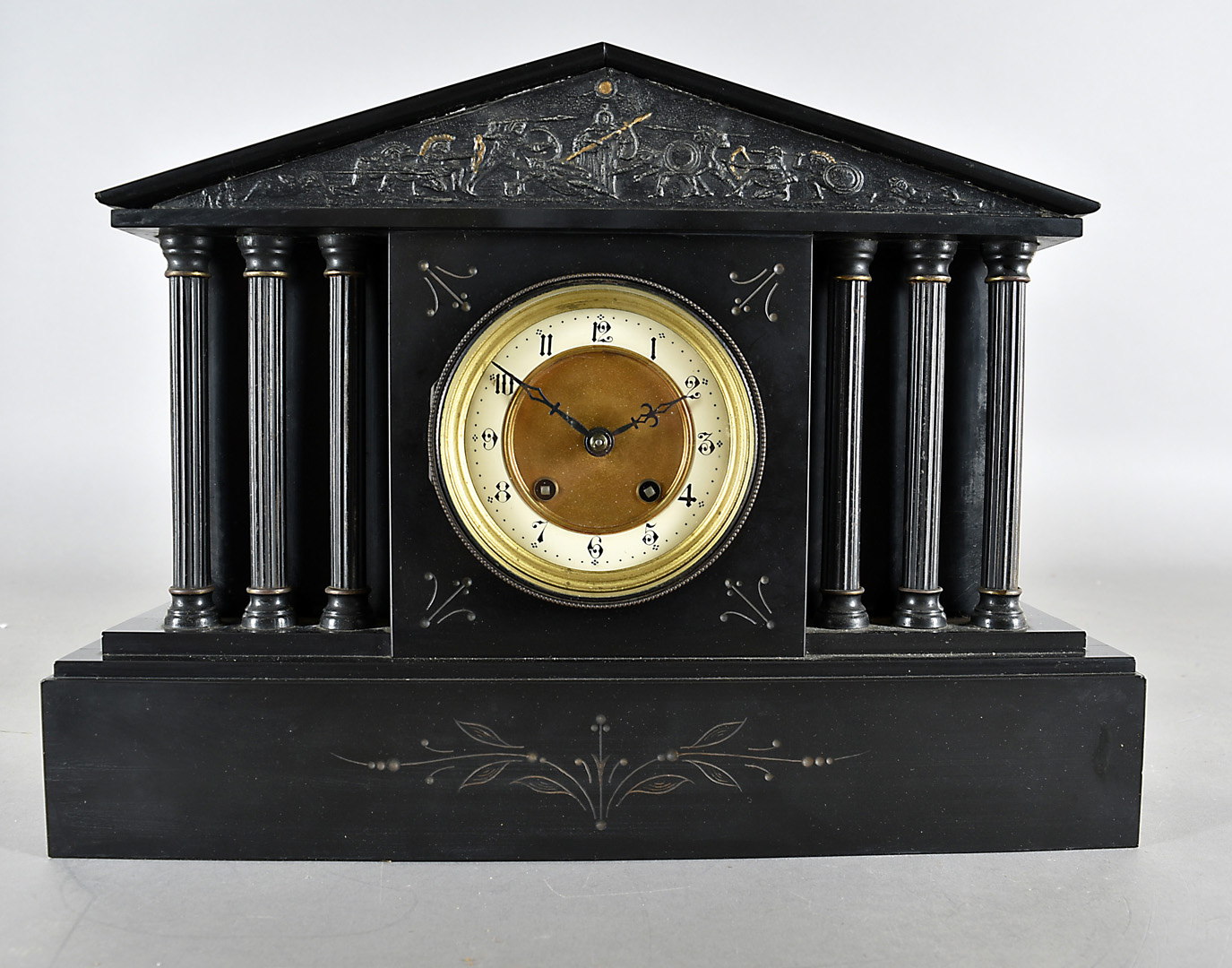 A 19th Century slate architectural mantel clock, with painted columns, arched pediment with
