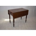 A Victorian mahogany Pembroke table, with one drawer, on turned supports, 75cm high, 92cm long x
