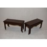 A pair of mahogany library steps, of rectangular form, with shaped frieze, in brass casters, 49cm