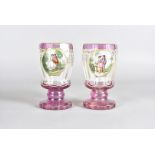 A pair of 19th Century Bohemian flashed glass vases, of faceted form, with oval cartouches of