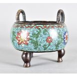 A late 18th Century Chinese Cloisonné three footed sensor, of circular shape, decorated with