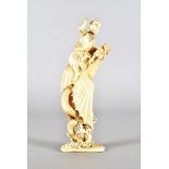 A large and impressive Meiji period ivory okimono, modelled as warrior upon a dragon, on