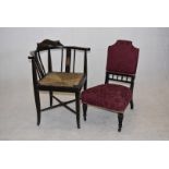 A 19th Century inlaid corner chair, having small inlaid panels with urn decoration, wicker seat, X