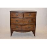 A mahogany chest of drawers, with two short over two long drawers, with brass locks to each