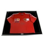 Michael Schumacher, a Ferrari signed T-shirt with COA 90cm x 73cm framed and glazed good condition