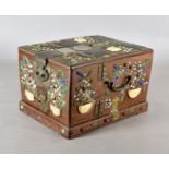 A 19th century Chinese hardwood and inlaid dressing table chest, brass bound exterior, the top