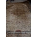 A large Royal Keshan cream ground carpet, having central diamond medallion, with multiple borders,