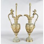 A pair of gilt metal table lamps, of classical jug form, to fitting 69 cm H
