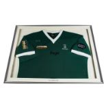George Best, an Irish Masters shirt, short sleeved with white trim framed and glazed good