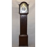 An early 19th Century 8-day longcase clock, with arched lacquered brass dial and silvered chapter