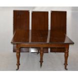 Large Telescopic Mahogany Dining Table of Victorian Origin, With three leaves on six turned supports