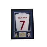 David Beckham, a white no 7 replica shirt displayed in a deep case with some description, two