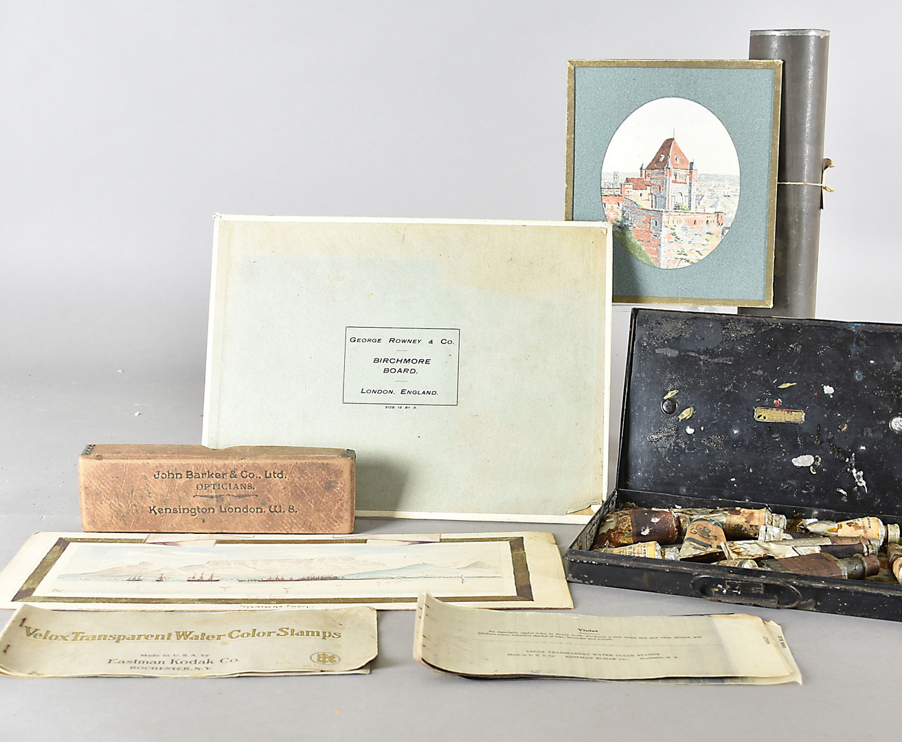 A collection of 19th century and early 20th century paints, paint brushes, including an enamel