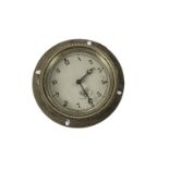 Motoring, a vintage Smiths car clock, with hinged case for dash mounting, silver dial black Arabic