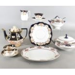 An Edwardian Whieldon Ware Norwood pattern part dinner service, comprising dinner plates, lunch