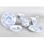 A Meissen Onion pattern six setting tea service, comprising cups and saucers, sandwich plates,