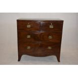 A small early 20th Century chest of drawers, having two over three drawers, with locks to all