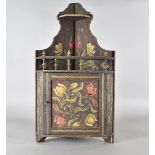 A continental poker work corner cabinet, the stained beach cabinet decorated with stylised tulip