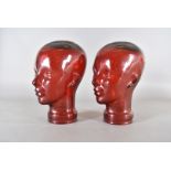 A pair of red glass heads, circa 1980, shop displays (2)