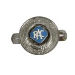 Motoring, a circular RAC Associate badge 8cm, (1936) with Diamond type blue enamel central badge