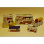 Atlas Editions Dinky, A boxed group of eight models including vintage commercial vehicles comprising