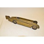 Gunthermann Golden Arrow, A clockwork tin plate land speed record car, in generally poor condition