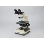 A Olympus CH 2 Microscope, serial no. 8C0149, two objectives, missing mains lead, body, G,