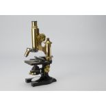 An Ernst Leitz lacquered brass and black-enamelled Compound Monocular Microscope, serial no.