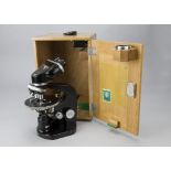 A Nikon Binocular Microscope, serial no. 78543, black, four objectives, Nippon Kogaku Tokyo logo,