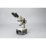 A Nikon Stereoscopic Microscope, serial no. 80094, black with grey stand, Nippon Kogaku Tokyo