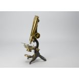 A late 19th Century Swift lacquered and anodised brass Paragon Compound Binocular Microscope, with