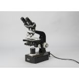 A Nikon Binocular Microscope, serial no. 42897, black, four objectives, face contrast condenser,