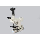 A Zeiss Axioskop Microscope, serial no. 451485, cream, trinocular head containing high eyepoint