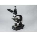 A Nikon Trinocular Microscope, serial no. 88517, black, four objectives, Nippon Kogaku Tokyo logo,