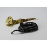 Ear Trumpets, one trumpet shaped telescopic in simulated tortoiseshell, the other with fabric-