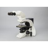 A Leica DM2000 Microscope, serial no. 308054-D62008, four objectives (three Leica, one American