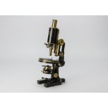 A Carl Zeiss lacquered brass and black-enamelled Jug-Handle Compound Monocular Microscope, serial